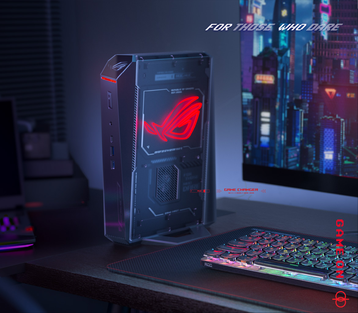 A ROG NUC 2025 stands on a black table next to an ASUS display monitor and keyboard