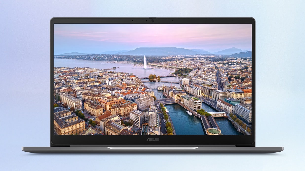 ASUS Chromebook Plus CB14 with 14-inch 16:9 FHD display with scenery inside the screen.