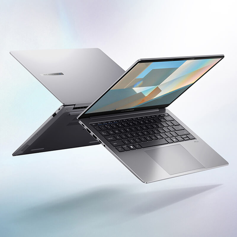Dos portátiles ExpertBook P5 parcialmente abiertos flotan en el aire, uno detrás del otro.