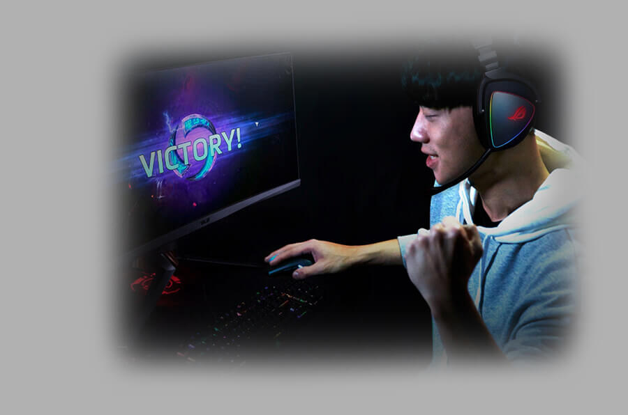 Person playing a computer game and celebrating victory