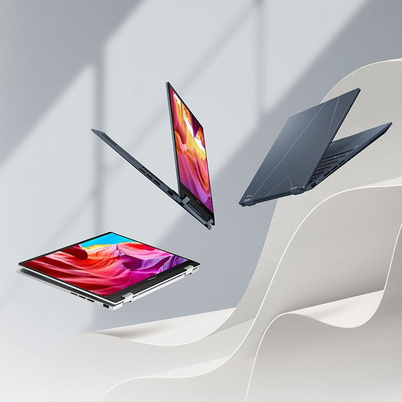 Three Zenbook 14 Flip OLED laptops floating in the air in tablet mode, tent mode, and clamshell mode.