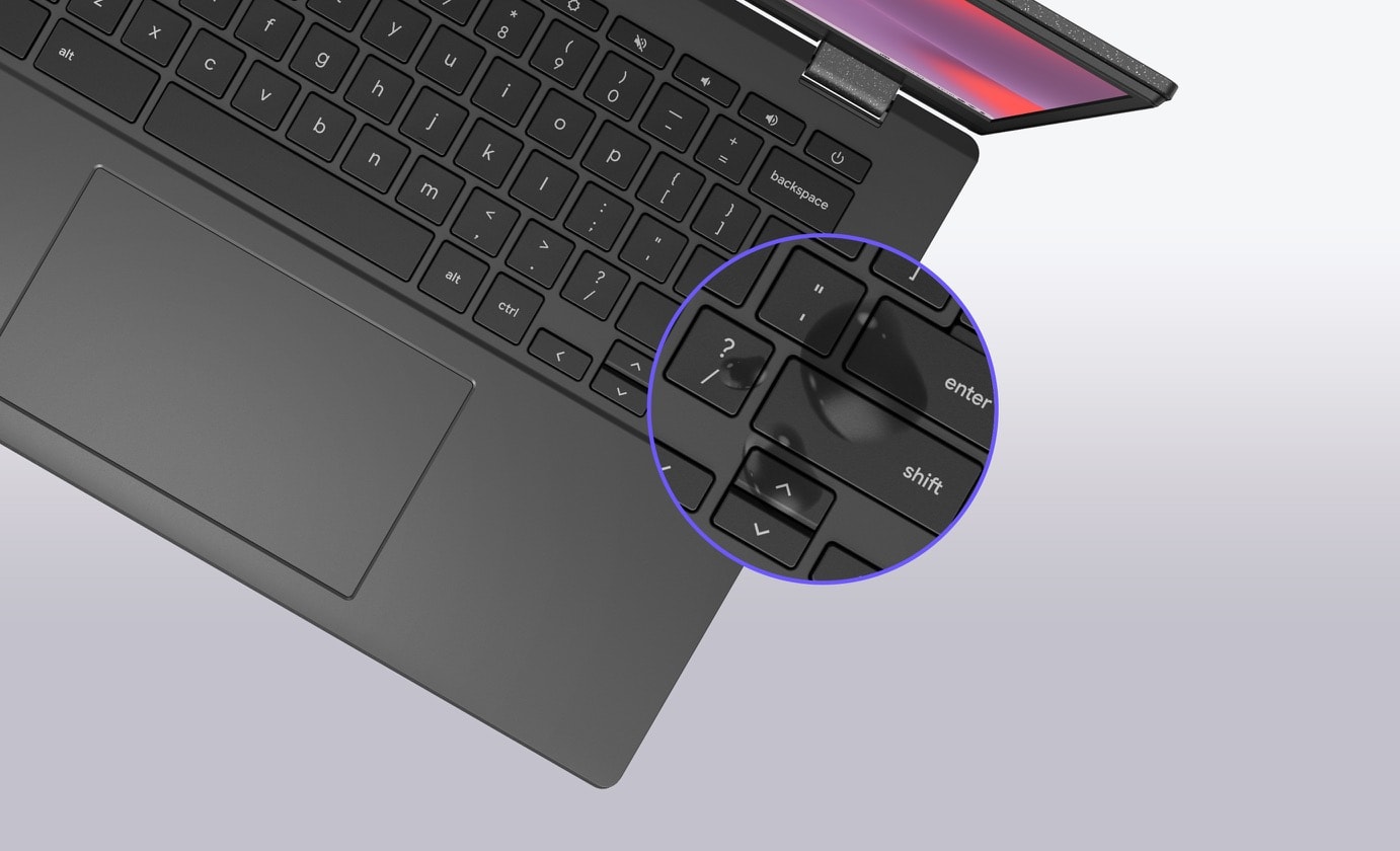 Eine Draufsicht auf ein ASUS Chromebook CM14 mit einer Nahaufnahme von Wassertropfen auf der rechten Seite der Tastatur. 