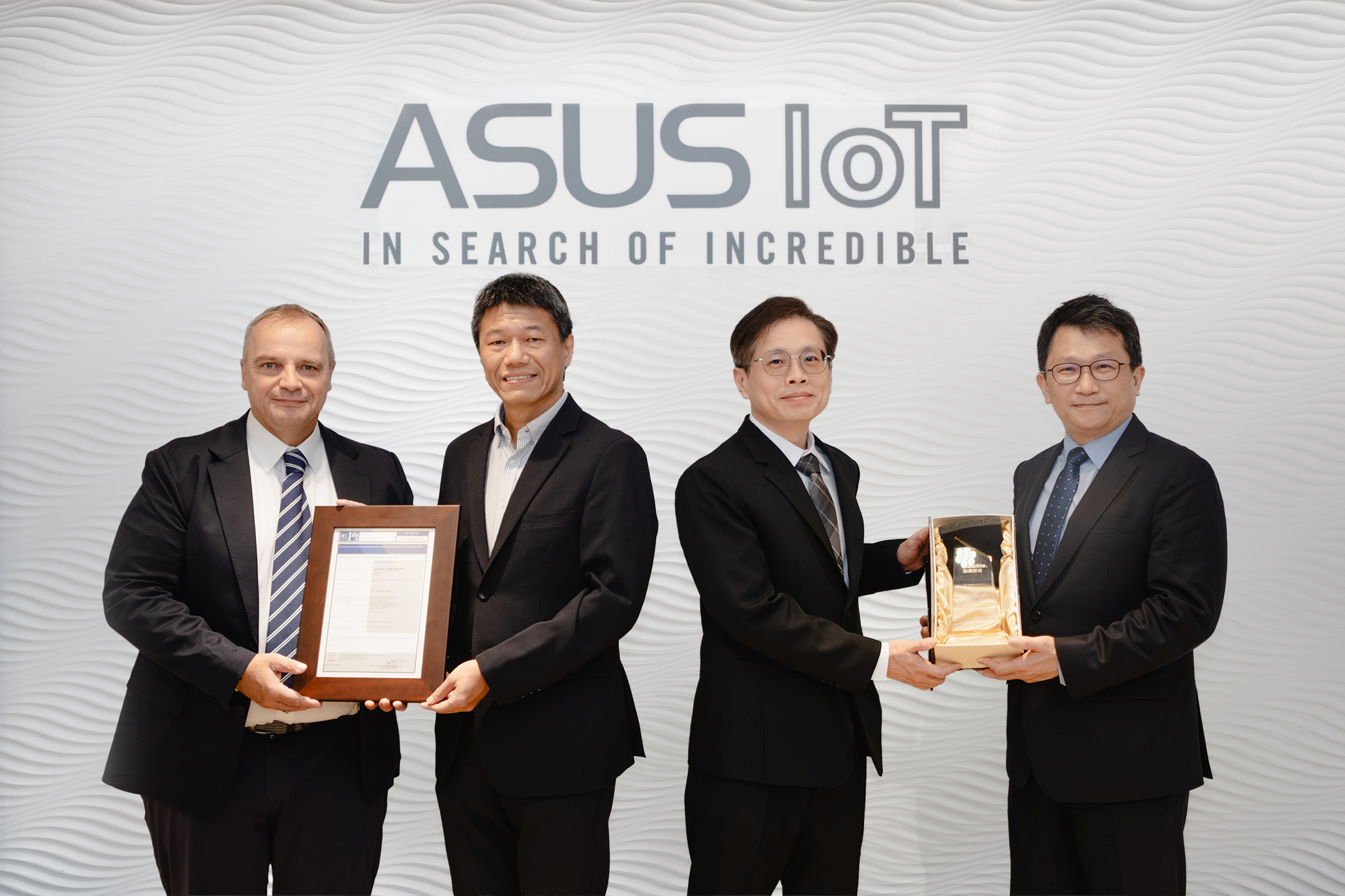 Group photo of ASUS IoT team receiving IEC 62443-4-1 cybersecurity certification