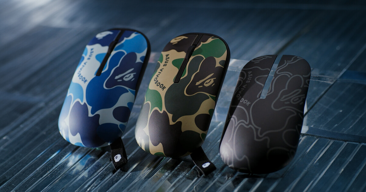 From the left to right, there is a blue mouse, a green mouse, and a black mouse cover. All of them have BAPE® camo patterns and ASUS Vivobook designs.