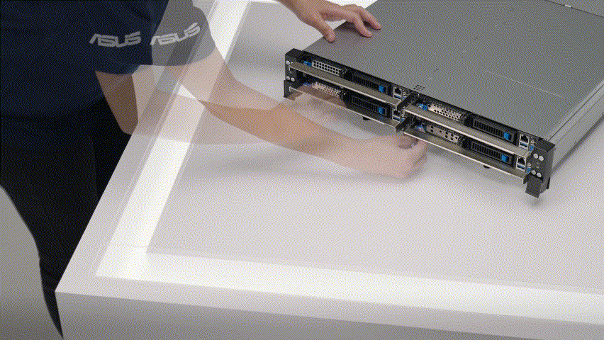 Person demonstrating front-access server node removal from chassis, allowing maintenance without entering hot aisles.