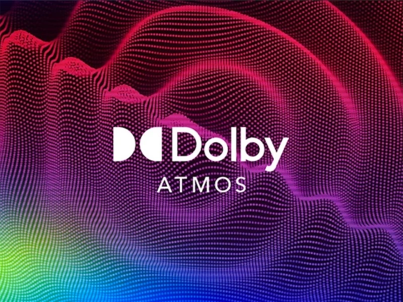 The Dolby Atmos icon in front of purple sound waves.