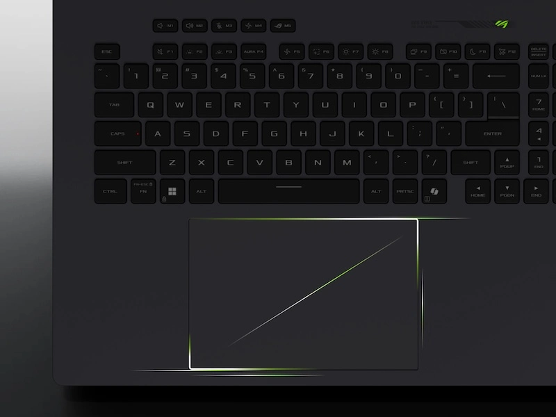 The shape of the G laptop’s touchpad is highlighted.