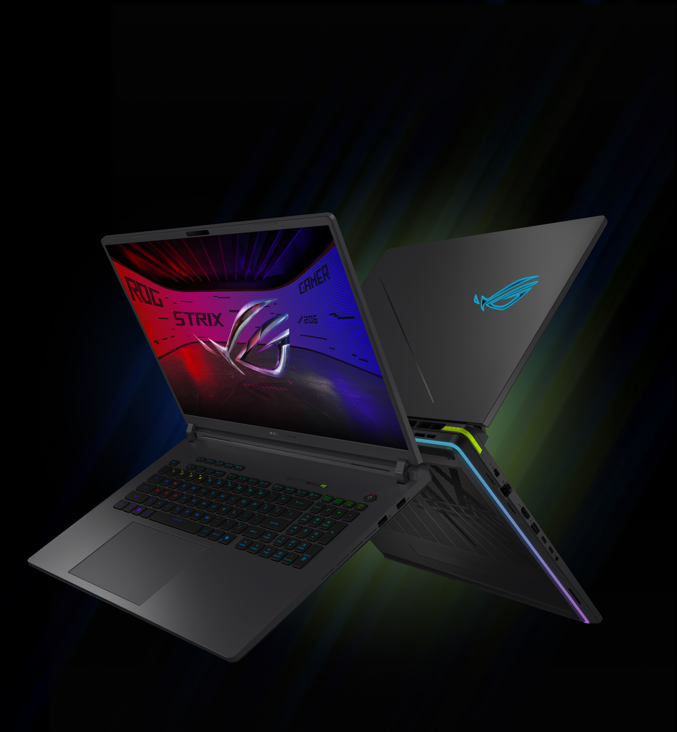 Two back-to-back ROG Strix laptops with the lids open and an ROG logo visible on screen, with Windows Hello text above the webcam.