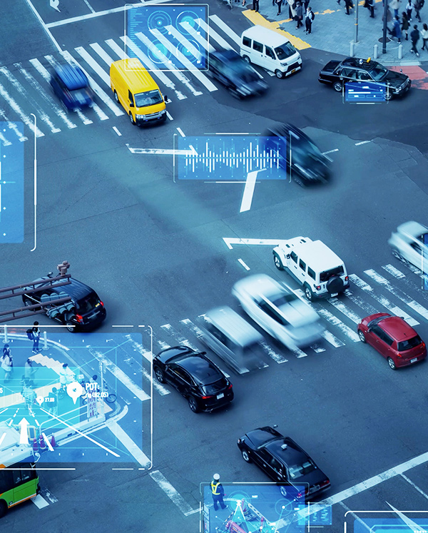 On the cross road, over 10 cars are passing through with analytics recording data