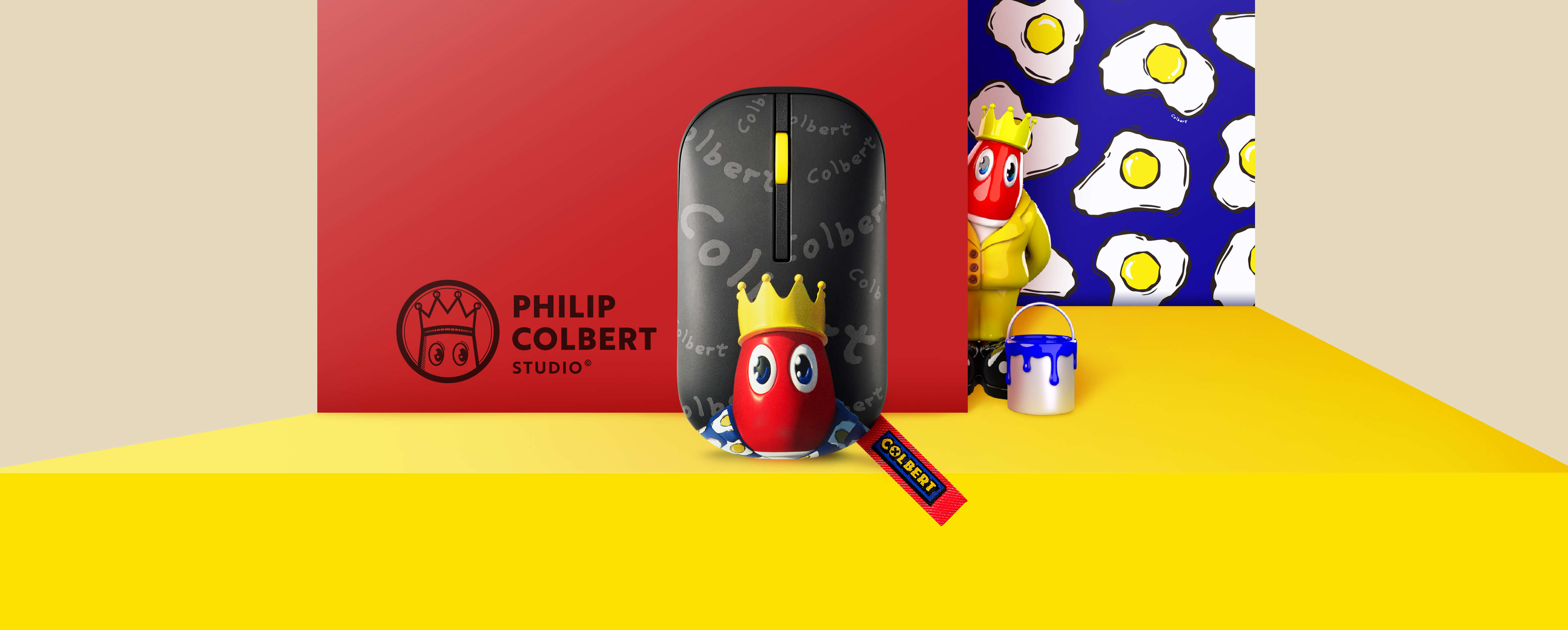 De ASUS Marshmallow Mouse MD100 Philip Colbert Edition is voorzien van een zwarte afwerking en Philip Colberts iconische kreeftcartoon. Een kreeftenfiguur in een geel pak tekent zich af tegen een kleurrijke achtergrond.