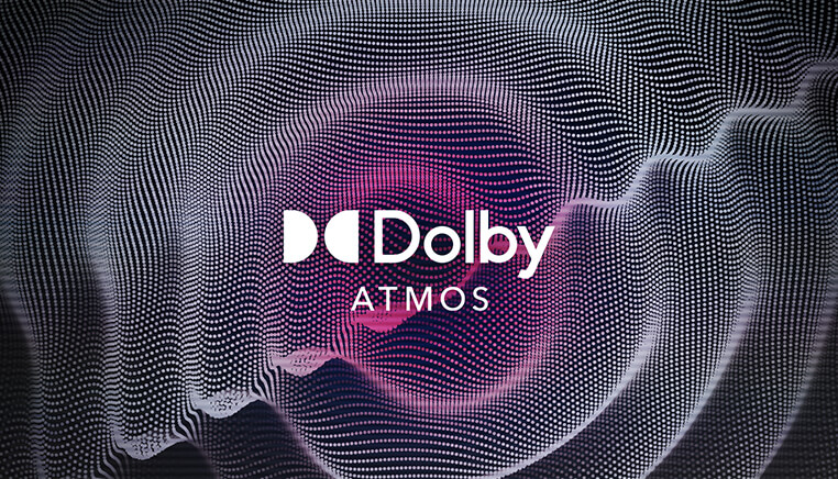 The Dolby Atmos icon in front of purple sound waves.