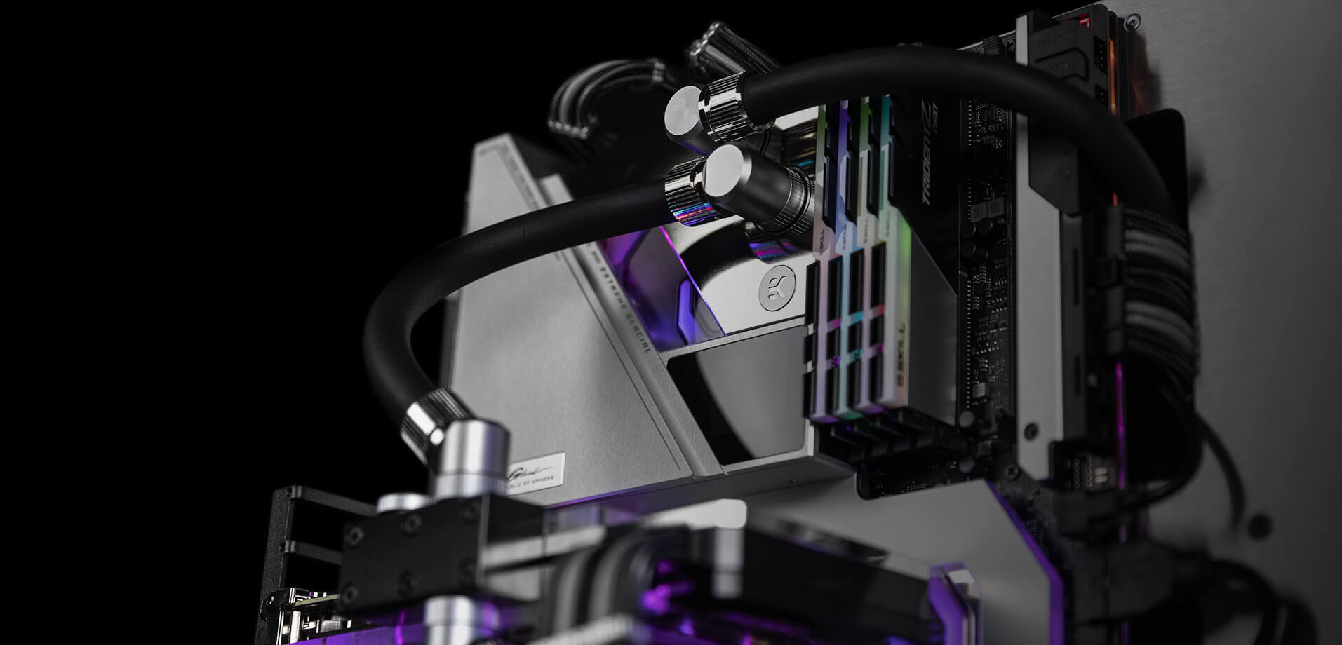 Closeup of ROG Maximus XIII Extreme Glacial with custom liquid cooling