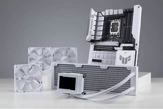 A TUF Gaming motherboard and AIO Cooler on the table