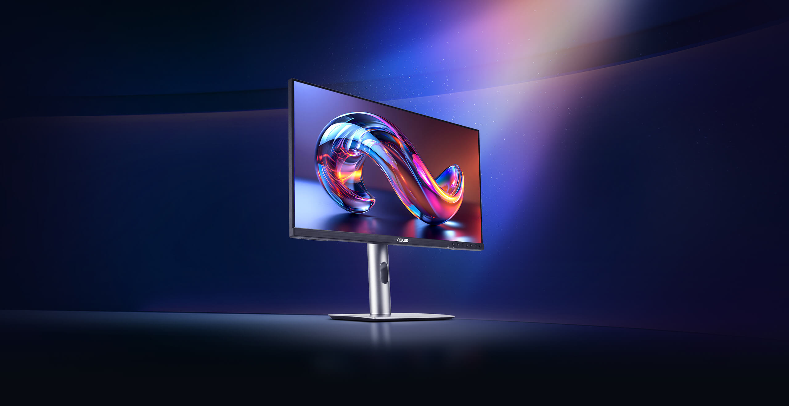 ProArt-monitor met een levendig, abstract ontwerp op het scherm tegen een dynamische blauw en paars verlichte achtergrond