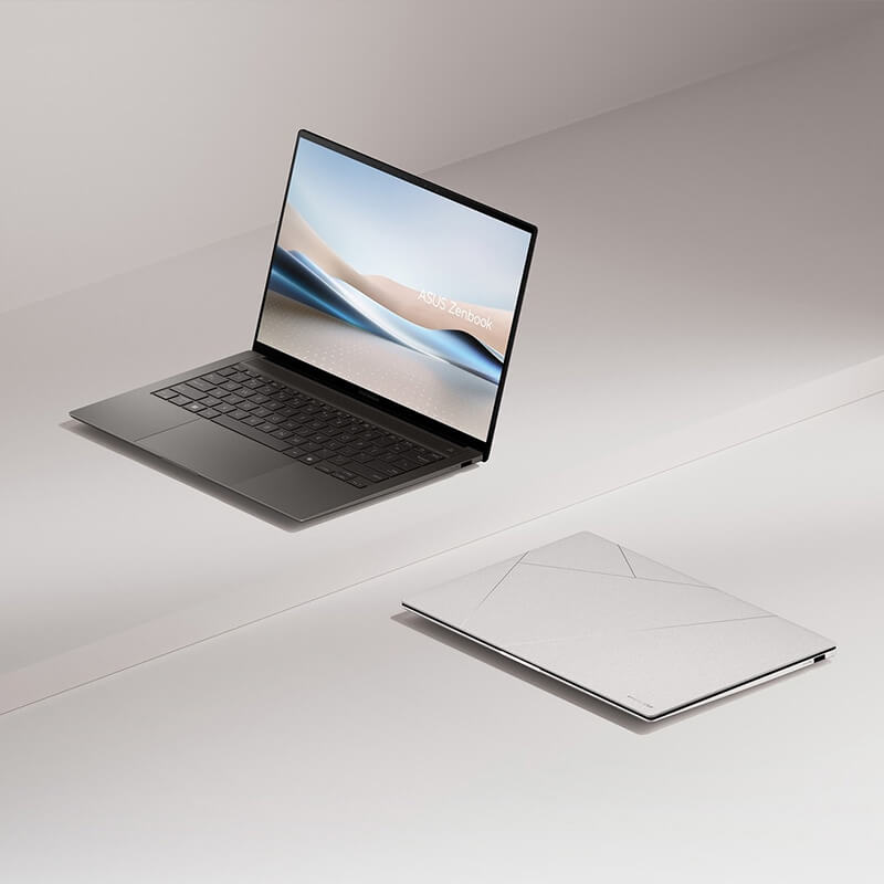 A wide-open ASUS Zenbook S14 (UX5406) showing the physical keyboard half-covering the lower screen.