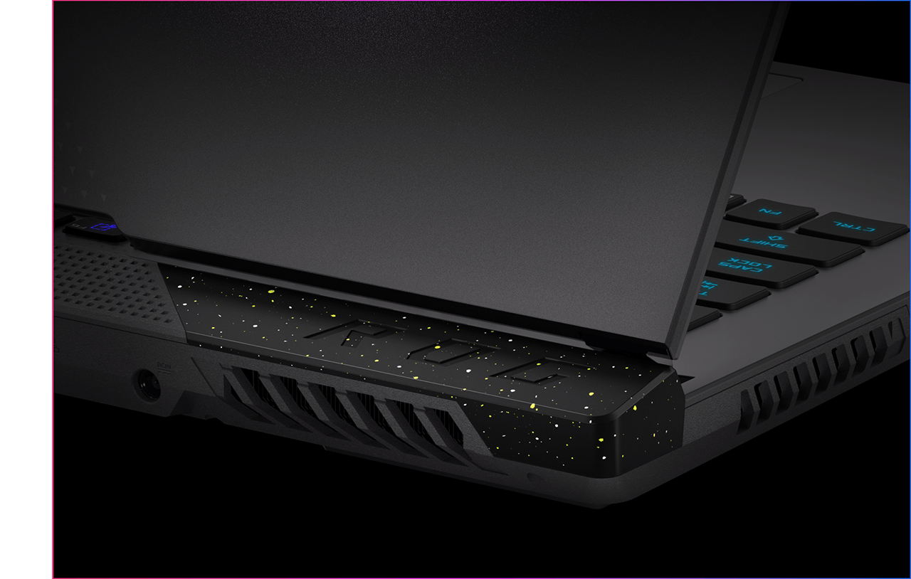 The image shows the Strix G's sporty black Armor Caps