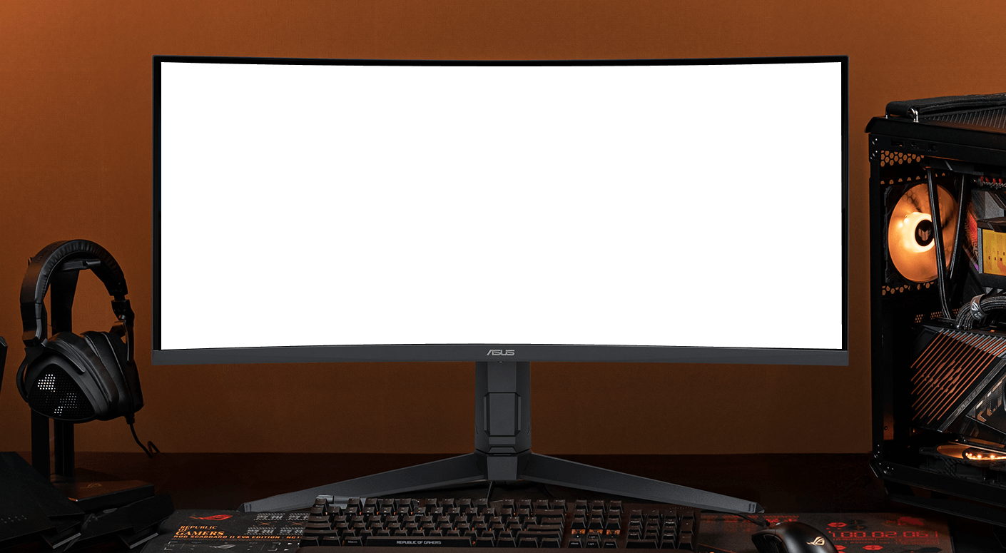 A VG34WQML5A monitor centered in frame, with a keyboard positioned in front, headphones to the left, and a computer tower to the right.