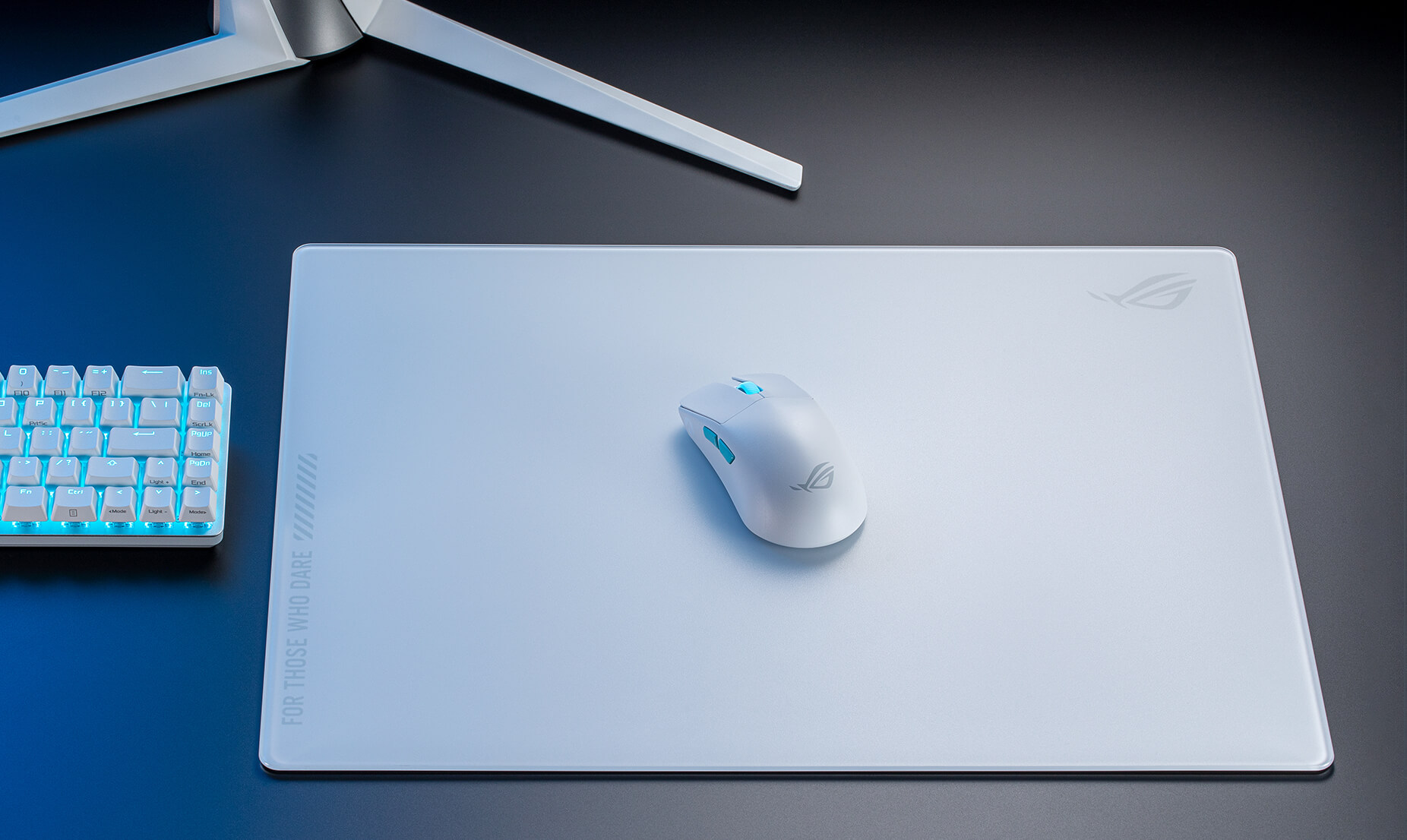 The moonlight white ROG Moonstone Ace L mouse pad in a full set up with the moonlight white ROG Harpe Ace Aim Lab Edition