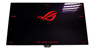 Three different monitors showing the same onscreen content, but with varying levels of black intensity. The left monitor features a matte surface, the middle monitor shows a blacker hue, while the monitor on the right shows a purplish tone. 