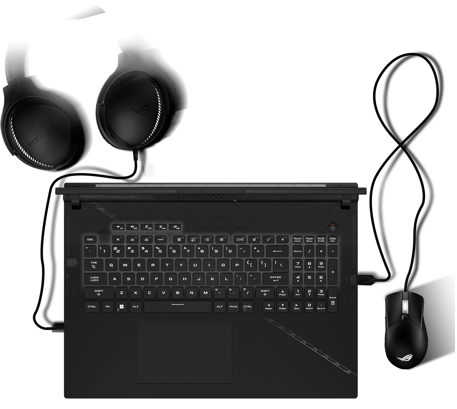 Pohľad na klávesnicu so svetelnými efektmi Aura synchronizovanými s myšou a headsetom.
