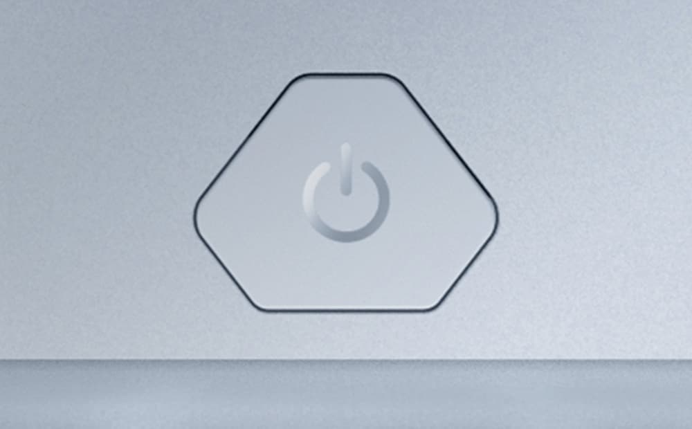 Крупный план новой кнопки включения на белом ноутбуке ROG Zephyrus G16.