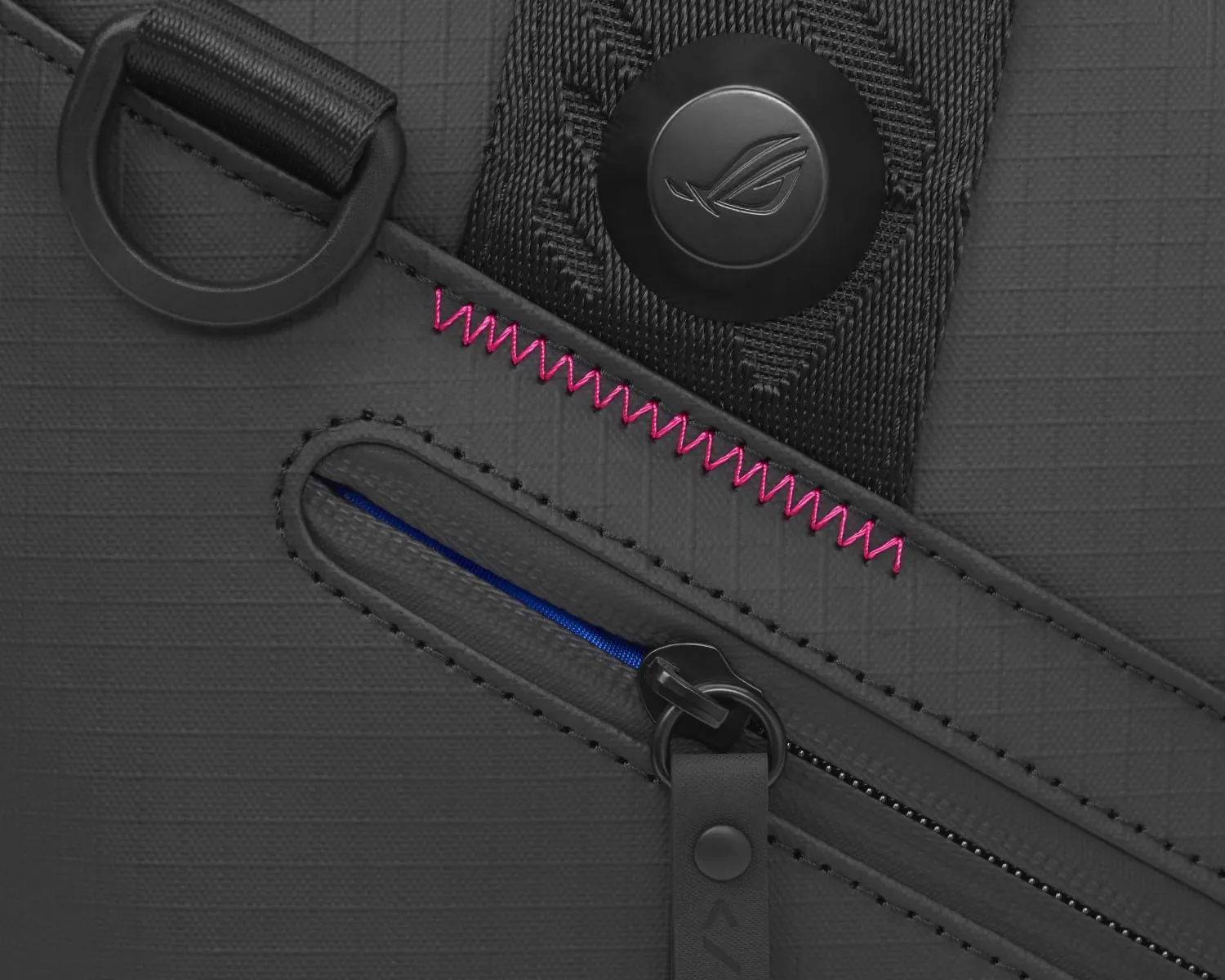 Extreme close-up of the ROG SLASH Duffle Bag's exterior zipper