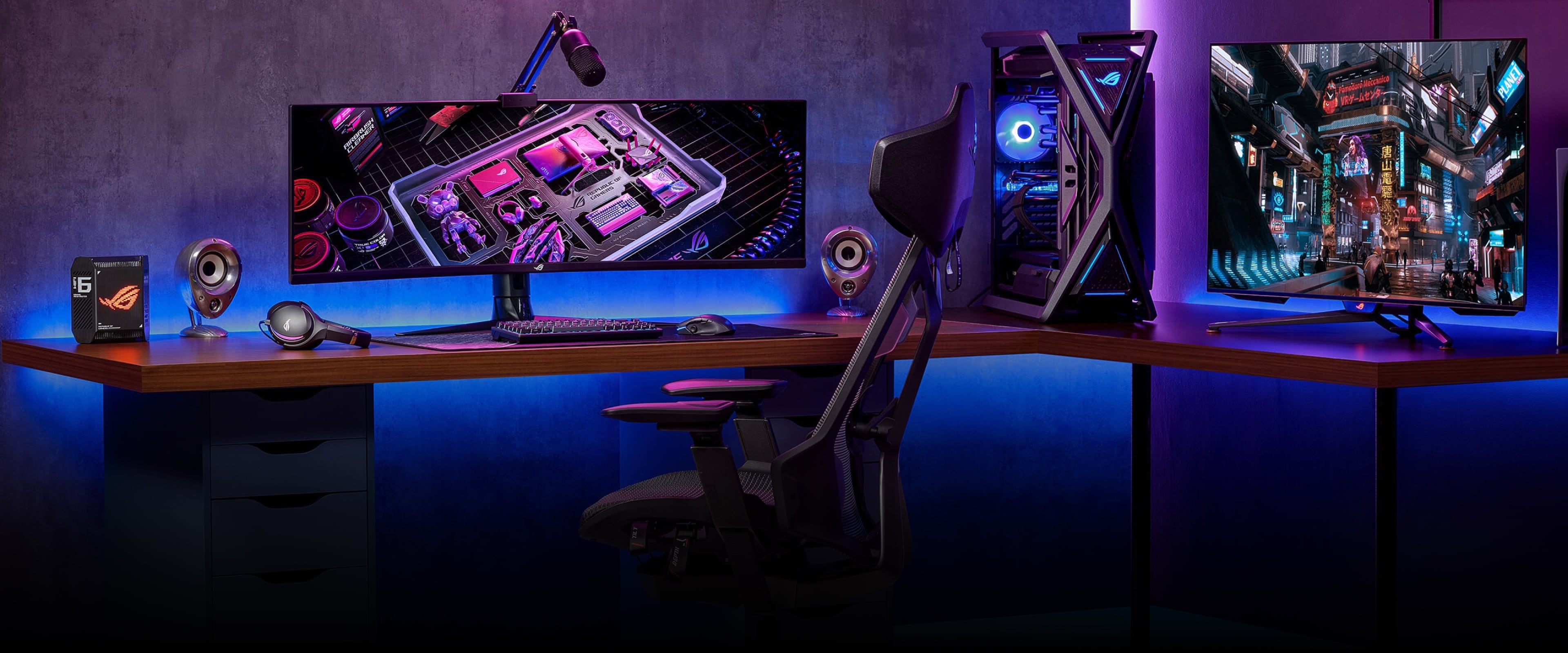 ROG gaming setup with a PC,  monitor, a keyboard and mouse set, and a headset