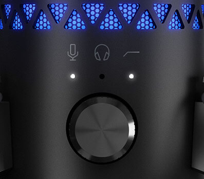 La partie centrale du bouton de commande multifonctions avec l'indicateur lumineux du volume du microphone et du filtre passe-haut s'allume.
