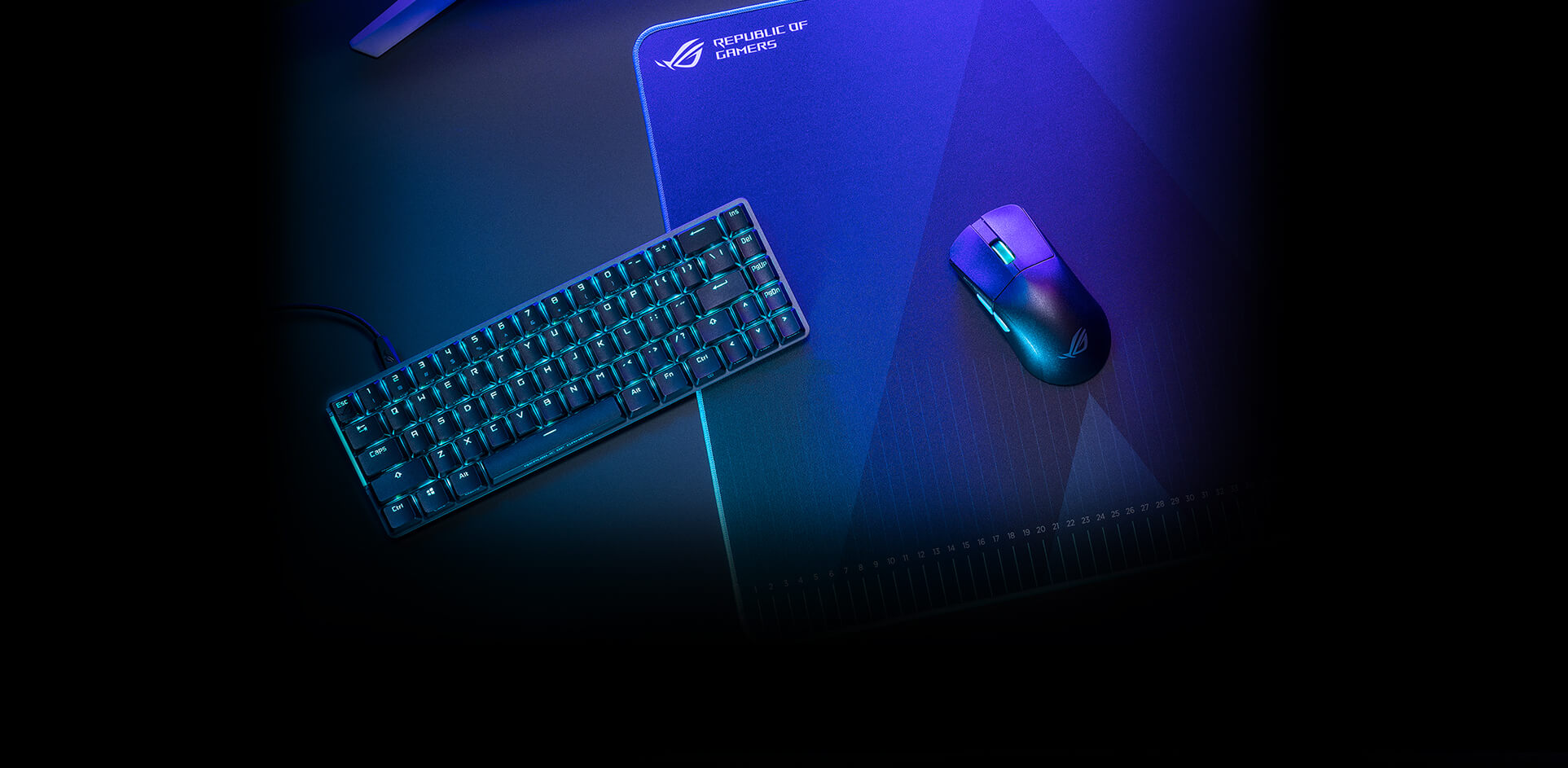 ROG Harpe Ace Aim Lab Edition mouse and the ROG Falchion Ace keyboard placed on top of the ROG Hone Ace Aim Lab Edition mouse pad 