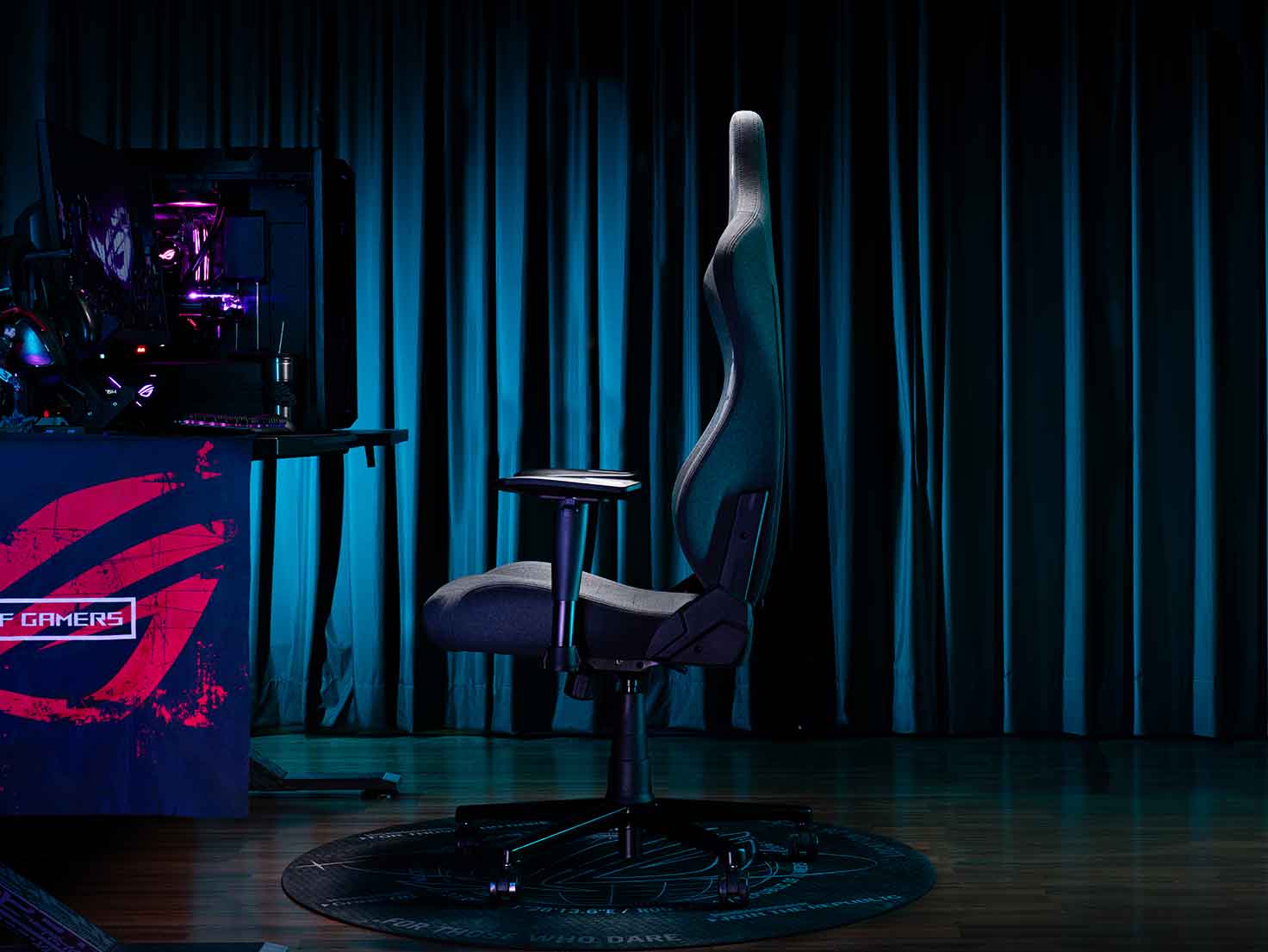 Side view of the ROG Aethon gaming chair in a gaming room