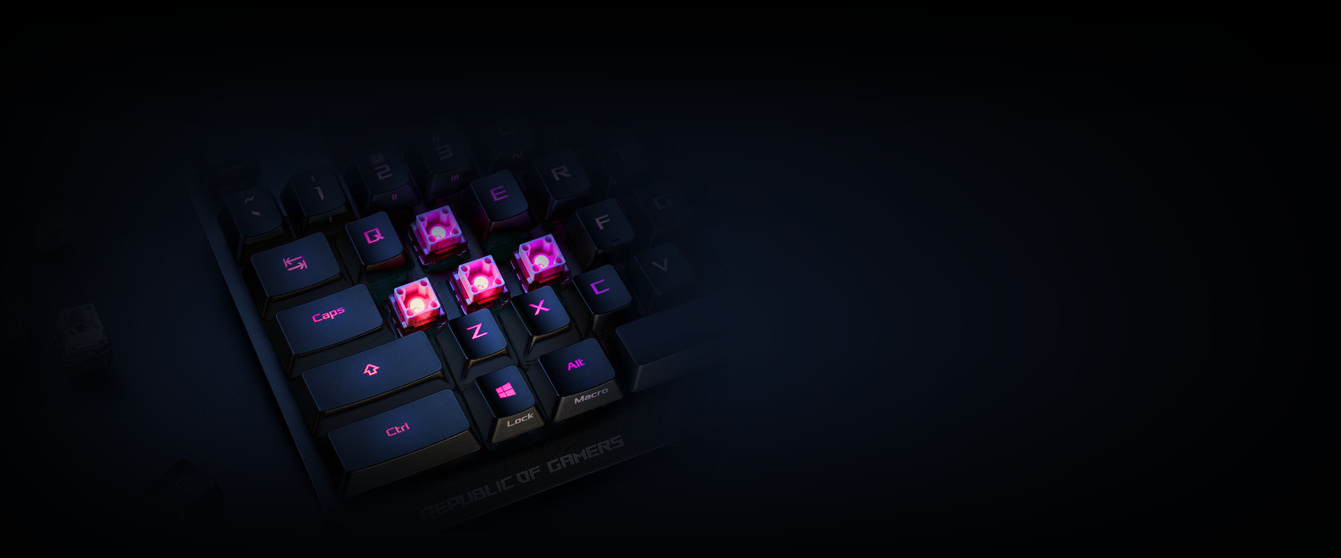 ROG Strix Scope RX with WASD keycaps removed to show the central lighting of the ROG RX switches