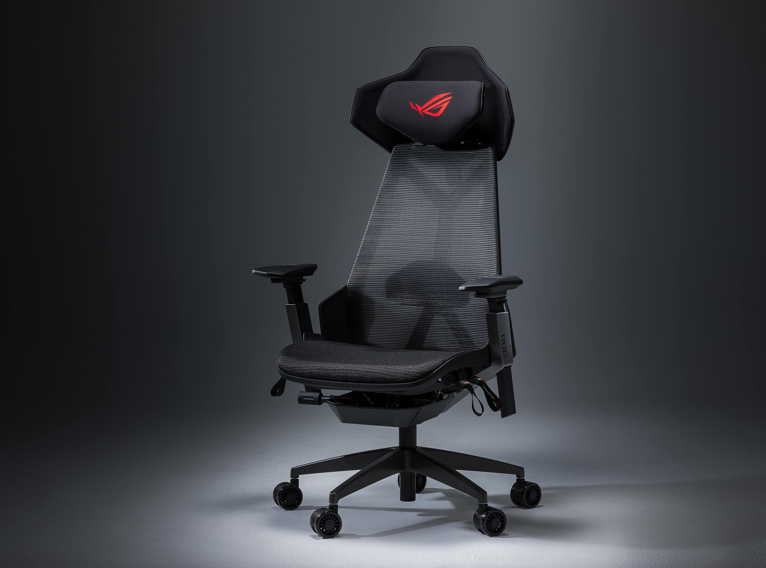 ROG Destrier Ergo Gaming Chair angled front view in a grey space