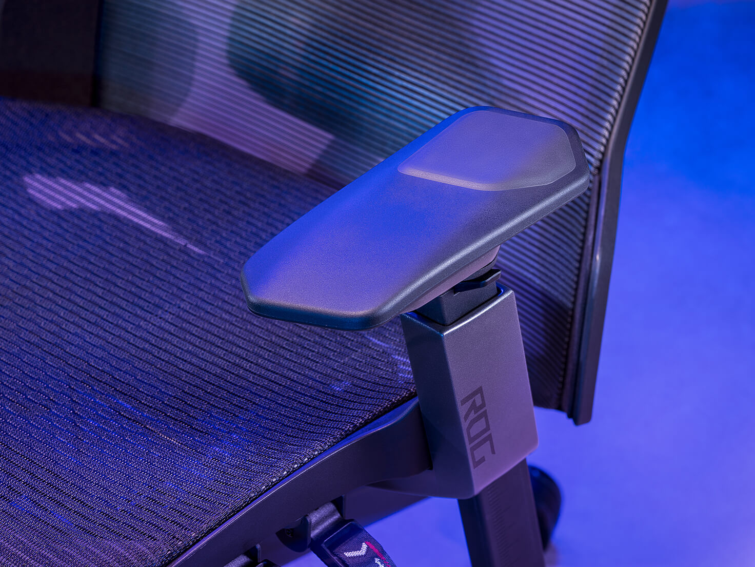 A close-up view of the PU foam material on the armrest of the ROG Destrier Ergo Gaming Chair