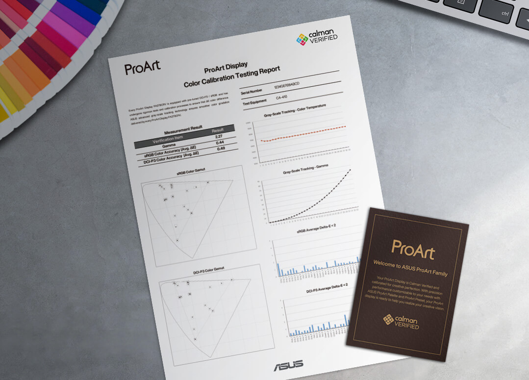A color calibration test report of ProArt Display lies on a creator's desk
