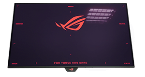 Three different monitors showing the same onscreen content, but with varying levels of black intensity. The left monitor features a matte surface, the middle monitor shows a blacker hue, while the monitor on the right shows a purplish tone. 
