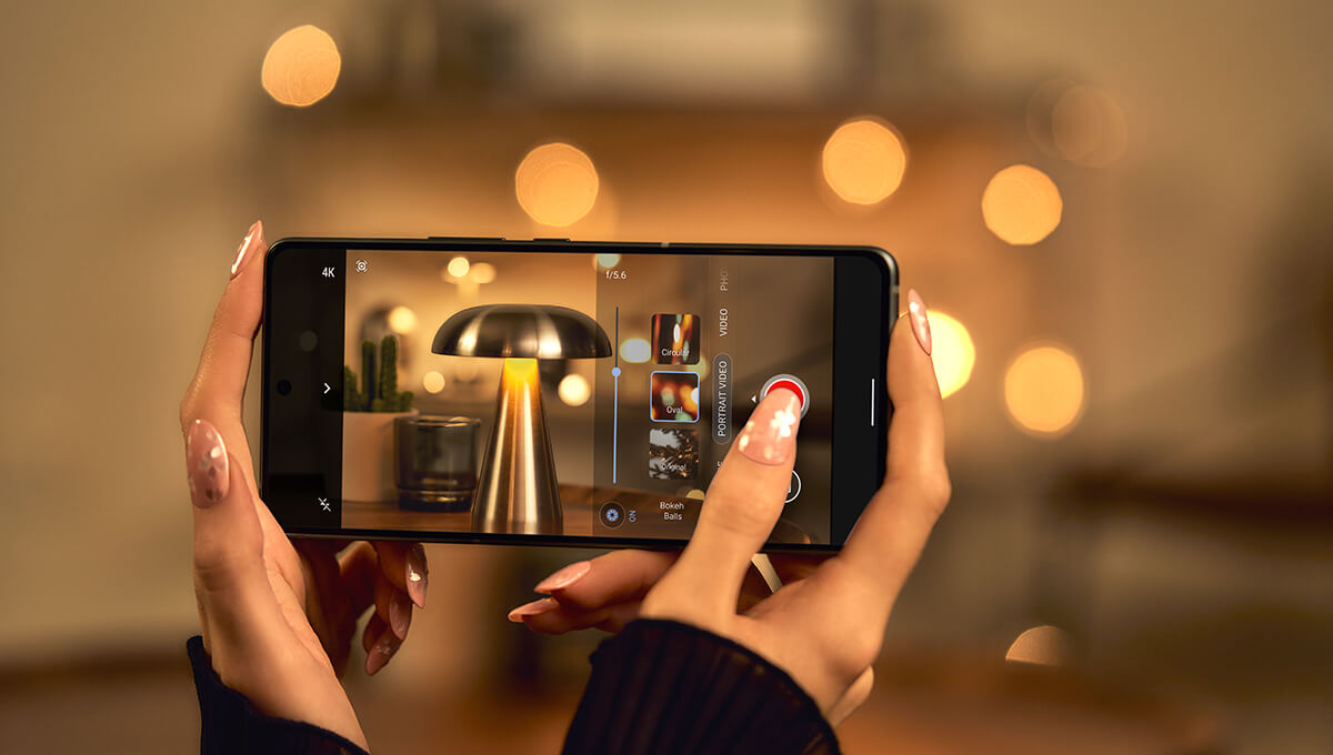 A woman recording a video using the AI Portrait Video mode on Zenfone 12 Ultra