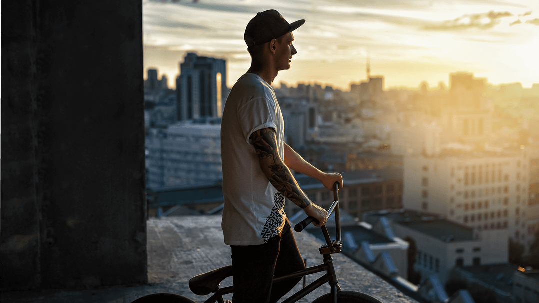 a BMX biker on screen with vibrant colors and clear background.