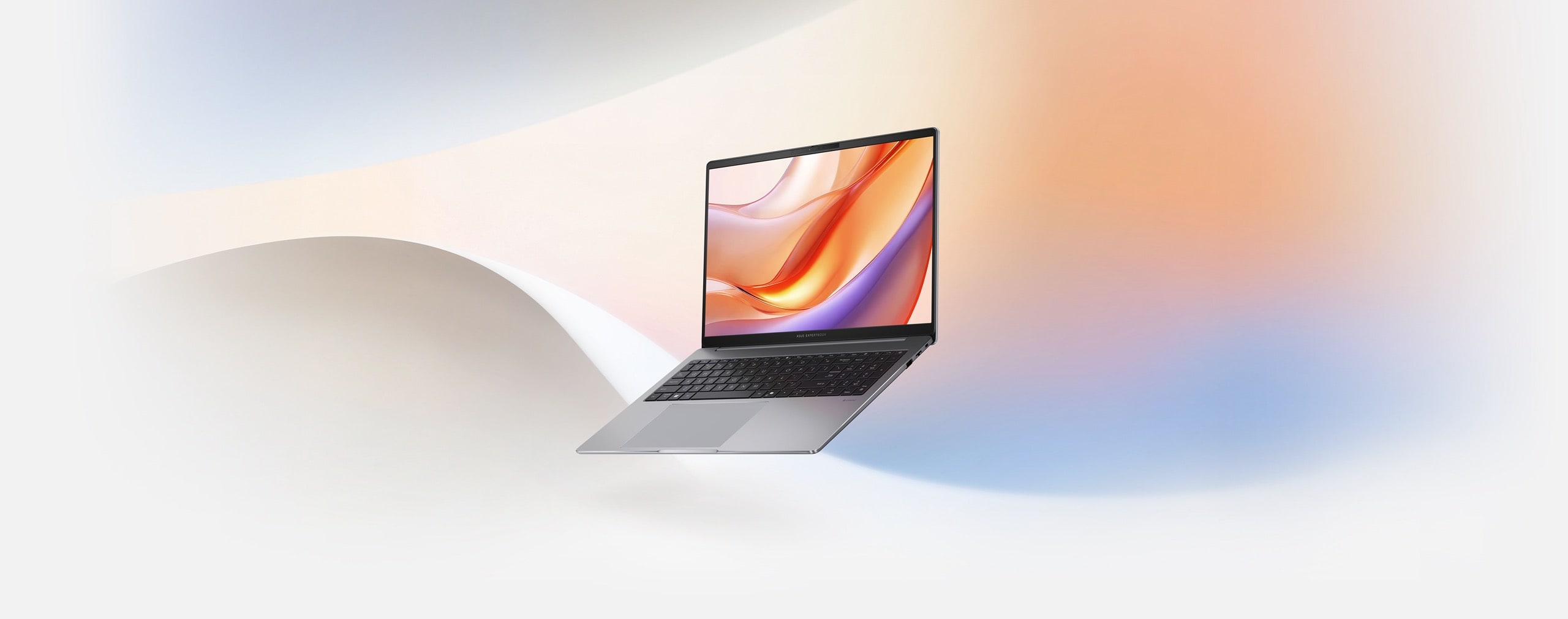 ASUS ExpertBook P3 is placed against a pastel-colored background.