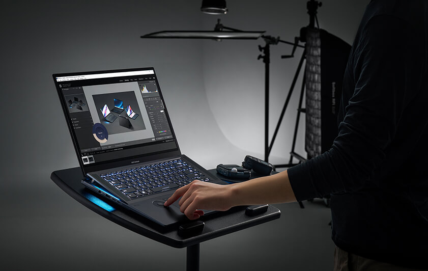 A person adjusting the image by Zenbook Pro 16X OLED.