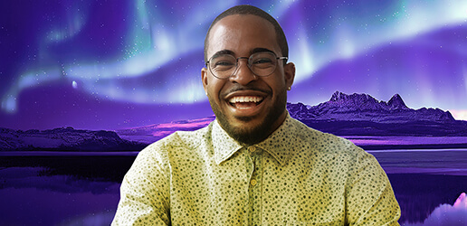 A person wearing a yellow shirt and glasses and smiling widely, with an AI generated background of aurora borealis behind them.