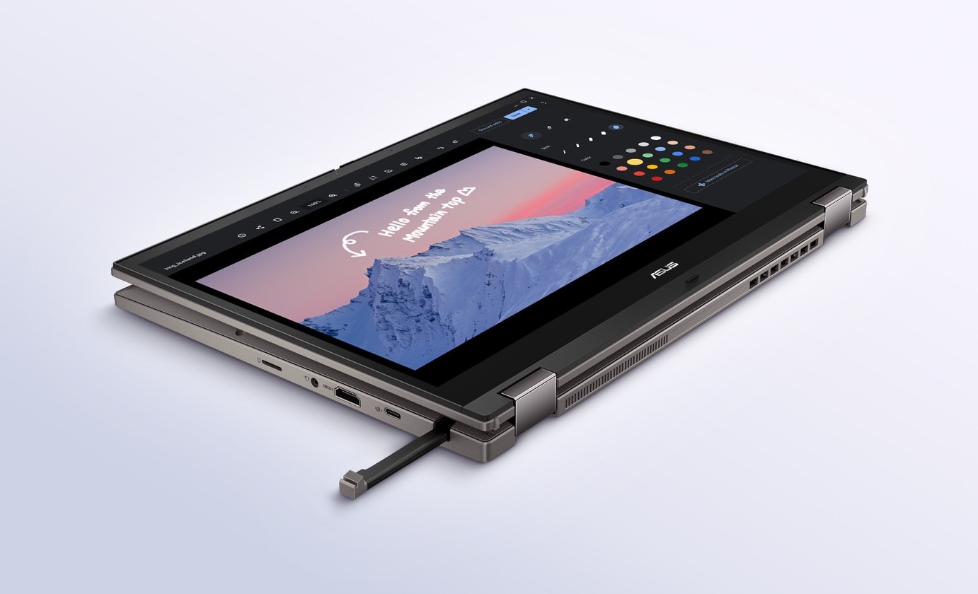An angled rear view of an ASUS Chromebook CM34 Flip in tablet mode with a stylus half inserted in the garage. 