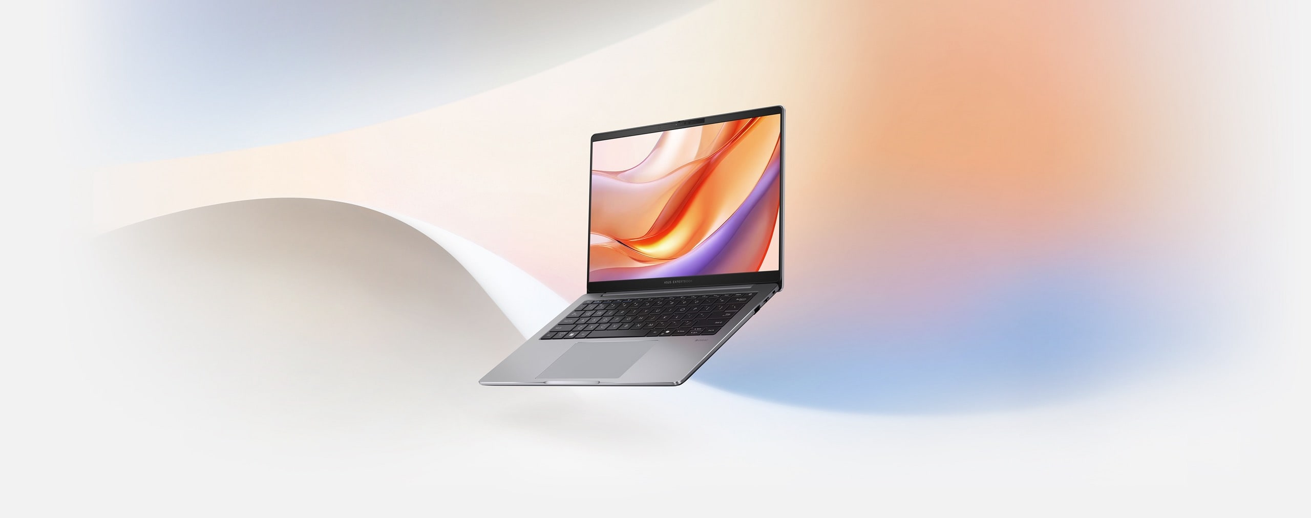 ASUS ExpertBook P3 is placed against a pastel-colored background.