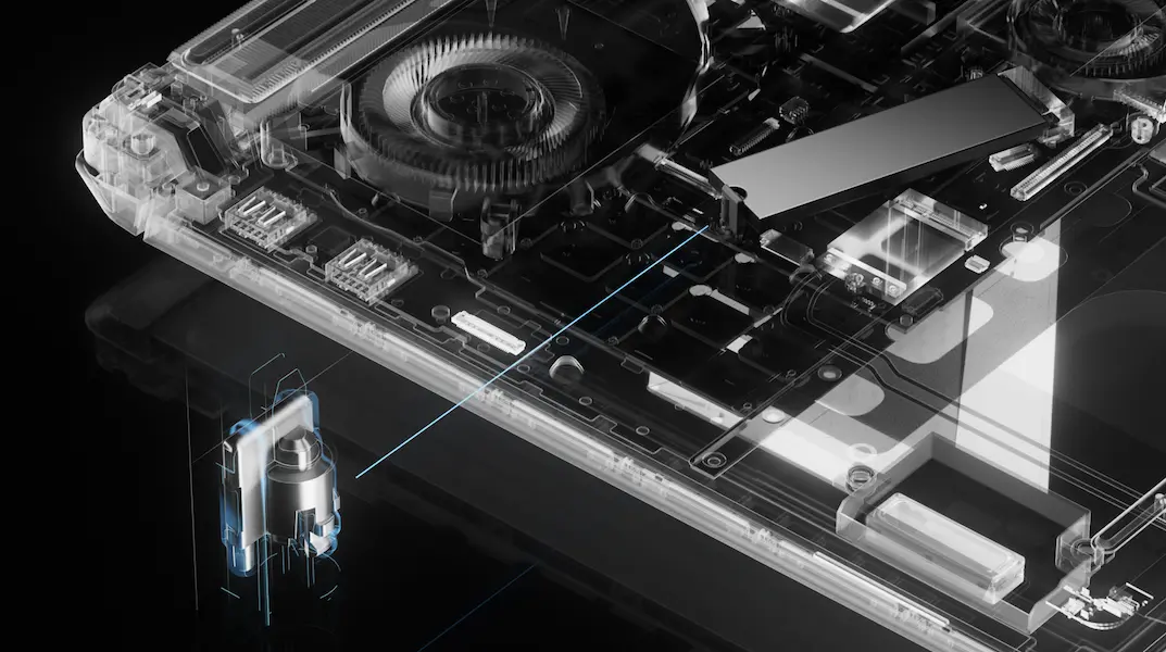 An X-Ray view of an ROG Strix laptop, with fans, storage, and other circuitry shown.