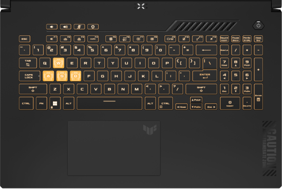 Extreme close-up of the keyboard deck, with the keys illuminated in yellow.