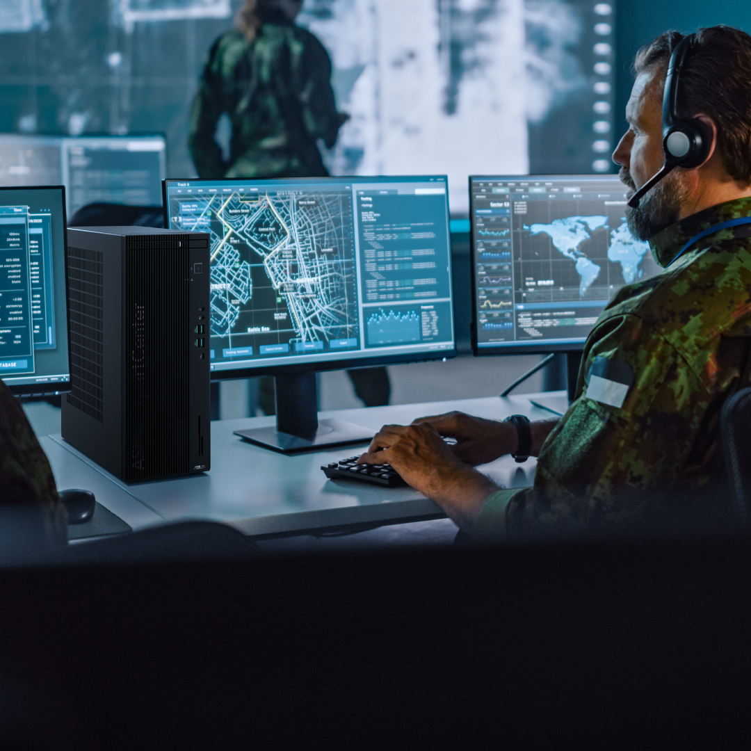 Some financial employees are sitting at the office, with ASUS ExpertCenter desktops and monitors on their desks, monitoring the stock market