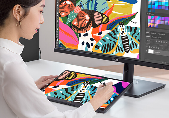 Žena kreslí perem ProArt Pen motýly na displeji ProArt Display PA169CDV, v pozadí monitor ProArt zobrazující motýly.