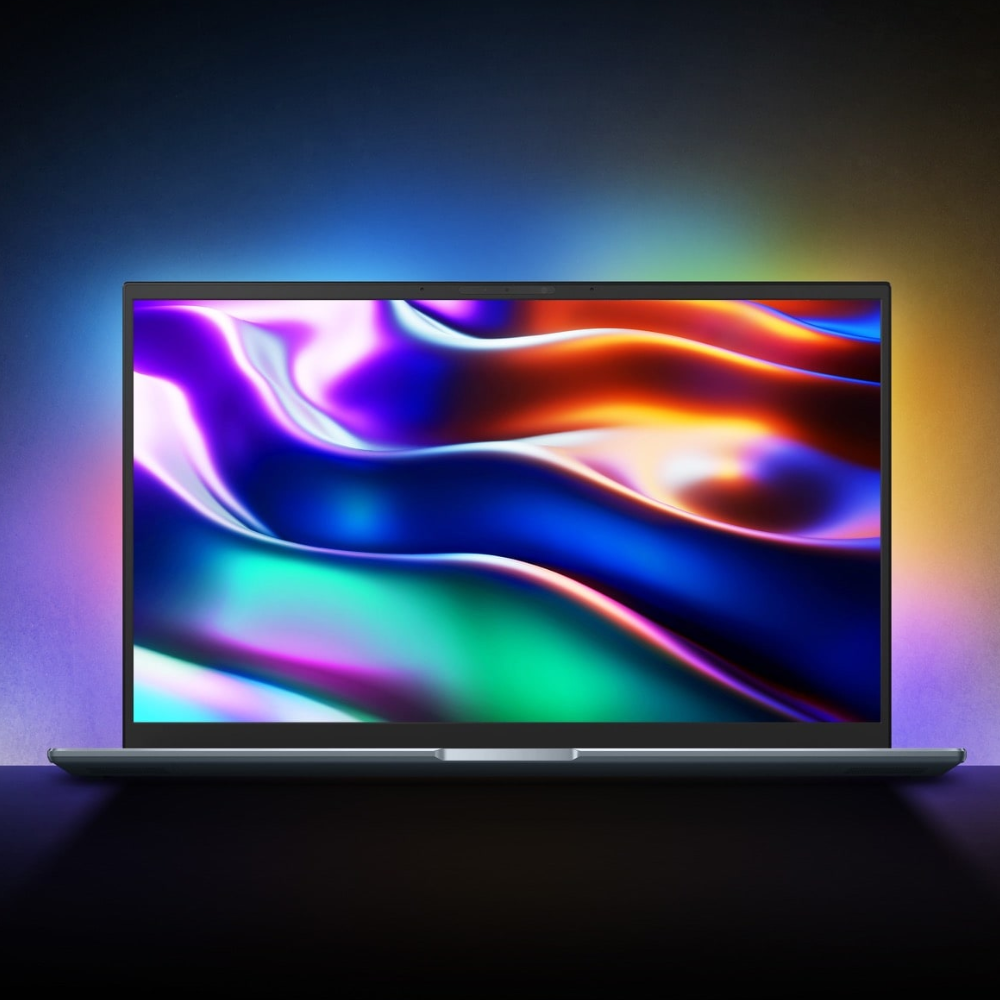 ASUS OLED Laptop with crisp, vivid, colorful wallpaper on the OLED screen
