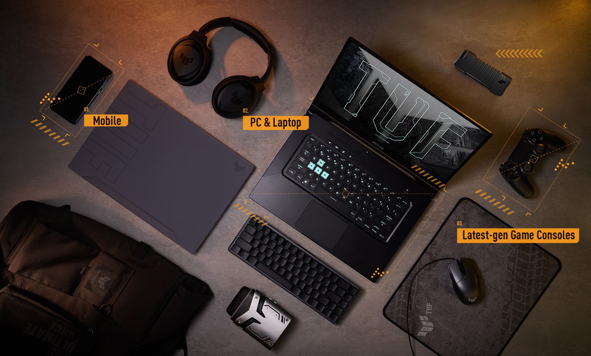 TUF Gaming product line up, including a laptop, a headset, a mouse and some other peripherals.