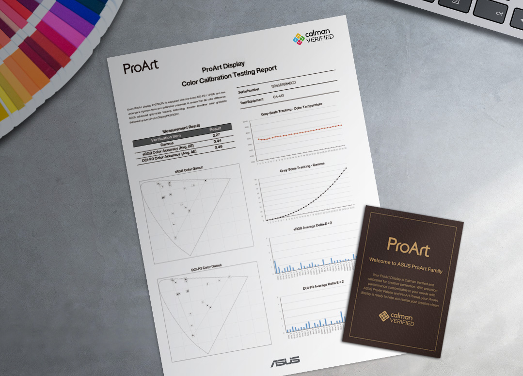 A color calibration test report of ProArt Display lies on a creator’s desk