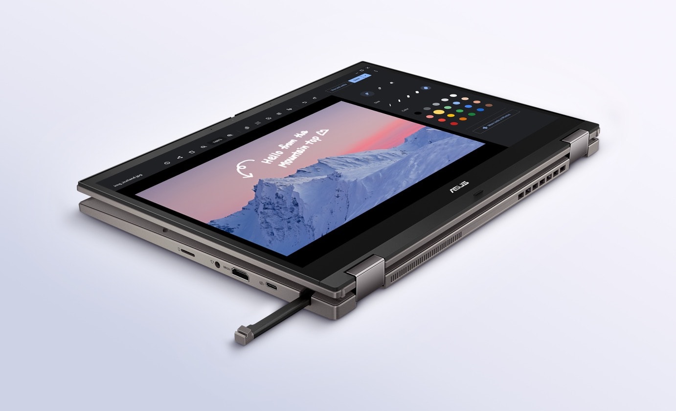 An angled rear view of an ASUS Chromebook CB34 Flip in tablet mode with a stylus half inserted in the garage.